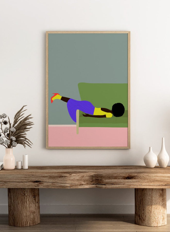 Simplified illustration of a person lying on a green couch with a gray wall and pink floor. Wendy’s Mood by Jota de Jai is a modern art print of a woman lounging dramatically on a green couch, officially licensed wall poster with fine art printing and framing.