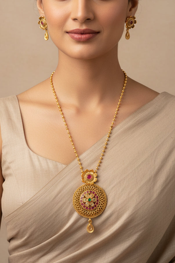 #LC1210 Traditional Indian gold-plated necklace featuring a round pendant with pink, green, and white stones