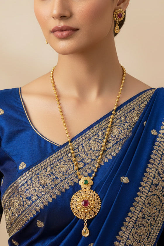 #LC1213  traditional South Indian gold-plated long haram necklace set pendant with red and green stones.