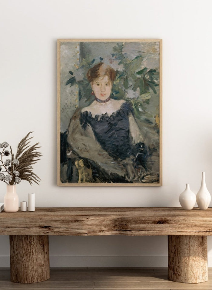 Le Corsage Noir by Berthe Morisot is a vintage Impressionist portrait print of a young woman in a black bodice, red ribbon, and white flowers behind her.