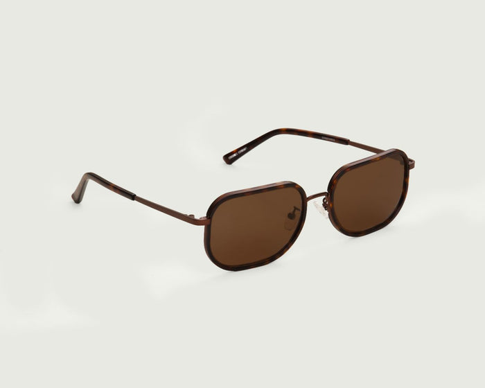 Classic Tort::Levi Sunglasses round brown plastic front diagonal