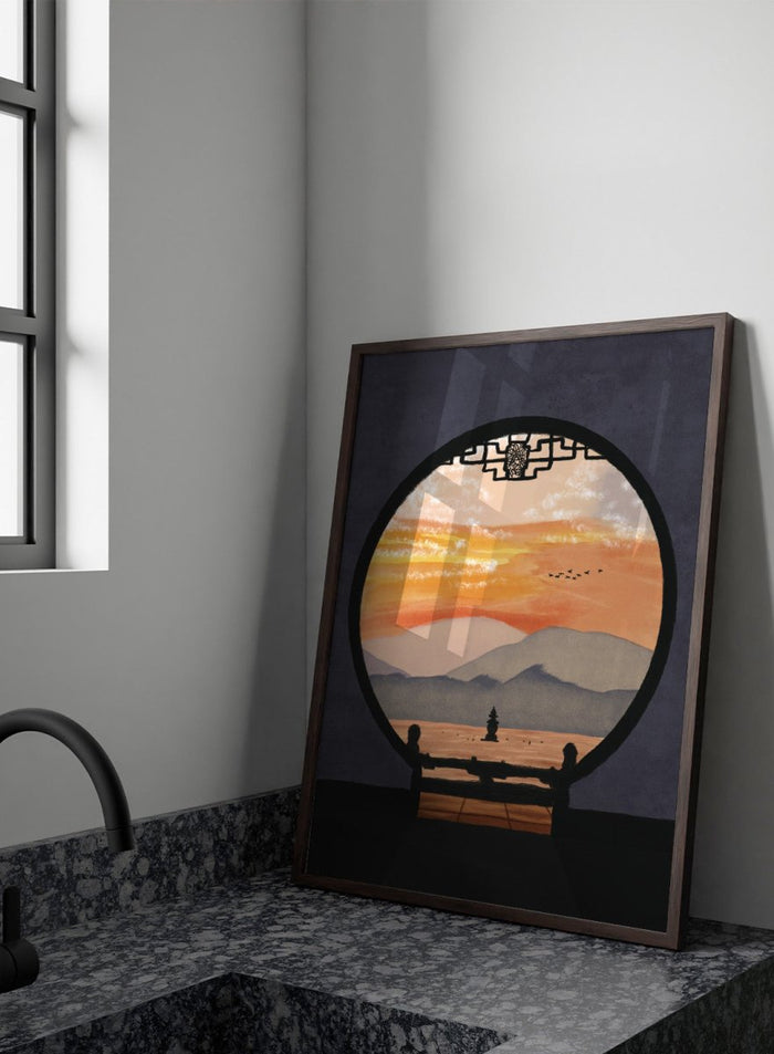 A framed art print depicting a scenic landscape viewed through a circular window frame. The scene shows layered mountains under a warm orange and yellow sunset sky with a small pagoda-like structure and birds, set against a dark gray background. Asian Pagoda Sunset View by Lisa Solomoniuk premium framed fine art print featuring layered mountains, a distant pagoda, and a glowing peach sunset.