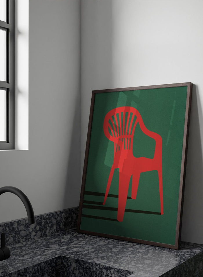Bold Red Chair by Lisa Solomoniuk premium framed fine art print featuring a vivid red chair, deep green background, and long black shadows.