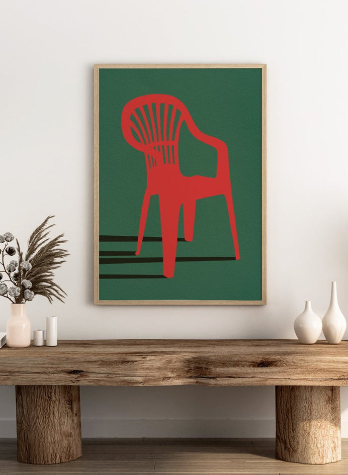 Bold Red Chair by Lisa Solomoniuk premium framed fine art print featuring a vivid red chair, deep green background, and long black shadows.