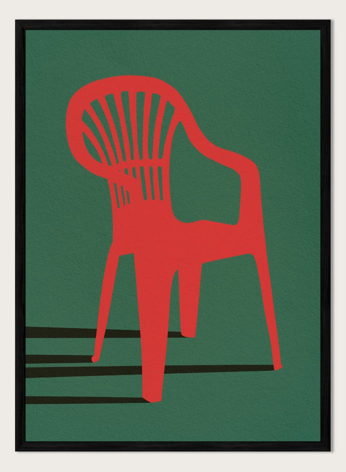 Bold Red Chair by Lisa Solomoniuk premium framed fine art print featuring a vivid red chair, deep green background, and long black shadows.