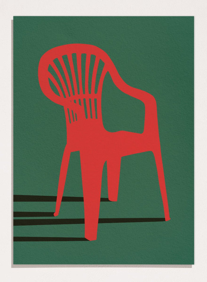 Bold Red Chair by Lisa Solomoniuk premium framed fine art print featuring a vivid red chair, deep green background, and long black shadows.