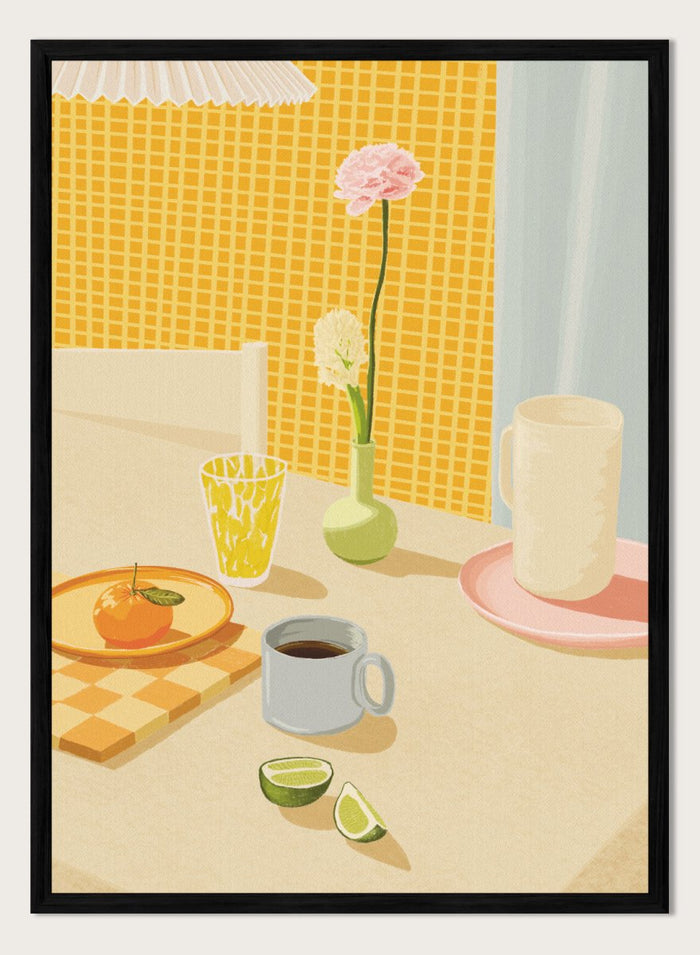 A stylized illustration of a tabletop scene with a pink flower in a small green vase, a yellow patterned glass, a white mug on a pink saucer, a gray mug of coffee, a sliced lime, and an orange on a checkered mat against a yellow tiled wall. Bright Breakfast Table by Lisa Solomoniuk premium framed fine art print featuring morning coffee, citrus fruit, flowers, and colorful tableware.