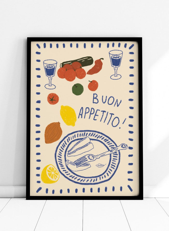 An illustrated print or card with the Italian phrase “BUON APPETITO!” in blue lettering, surrounded by hand-drawn food items including tomatoes, a lemon, an almond, a cucumber, a plate with bread and a fork, and two glasses with blue liquid. Buon Appetito Meal by Lisa Solomoniuk premium framed fine art print featuring a finished meal, wine glasses, fresh ingredients, and playful Italian lettering.