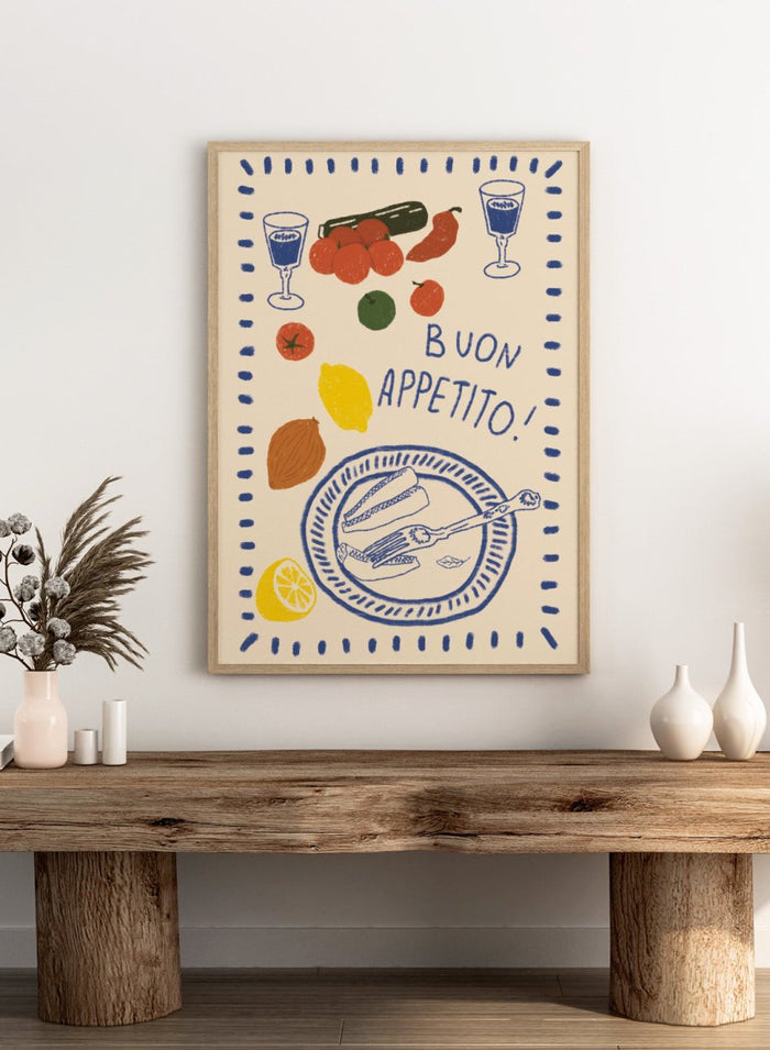 An illustrated print or card with the Italian phrase “BUON APPETITO!” in blue lettering, surrounded by hand-drawn food items including tomatoes, a lemon, an almond, a cucumber, a plate with bread and a fork, and two glasses with blue liquid. Buon Appetito Meal by Lisa Solomoniuk premium framed fine art print featuring a finished meal, wine glasses, fresh ingredients, and playful Italian lettering.