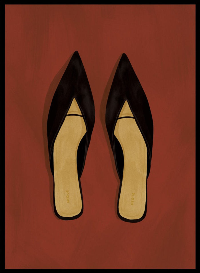 A pair of black pointed-toe flat mules with a contrasting beige insole, displayed flat against a solid reddish-brown background. Chic Black Mules by Lisa Solomoniuk premium framed fine art print featuring pointed black shoes with golden insoles against a rich rust red background.