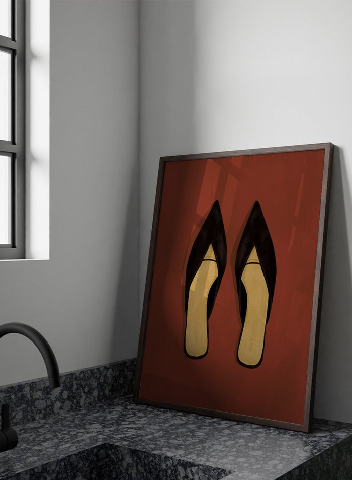 A pair of black pointed-toe flat mules with a contrasting beige insole, displayed flat against a solid reddish-brown background. Chic Black Mules by Lisa Solomoniuk premium framed fine art print featuring pointed black shoes with golden insoles against a rich rust red background.