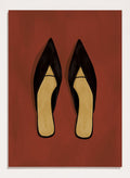 A pair of black pointed-toe flat mules with a contrasting beige insole, displayed flat against a solid reddish-brown background. Chic Black Mules by Lisa Solomoniuk premium framed fine art print featuring pointed black shoes with golden insoles against a rich rust red background.