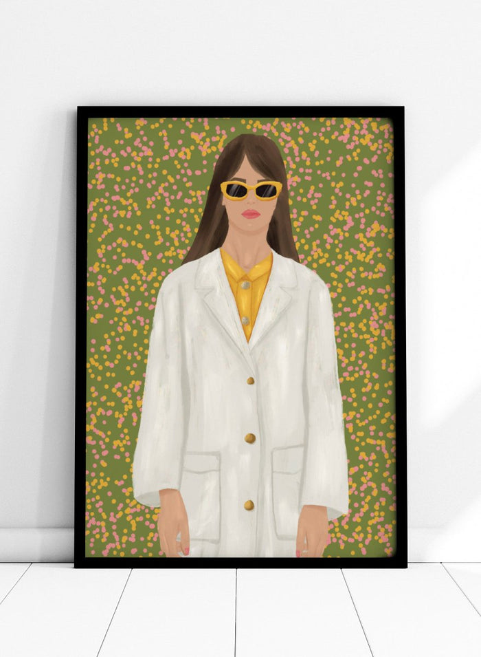 A stylized portrait of a woman wearing a white coat over a yellow top and yellow sunglasses, set against a green background filled with small pink and yellow dots. Chic Woman in Sunglasses by Lisa Solomoniuk premium framed fine art print featuring a woman in an oversized white coat and yellow sunglasses.