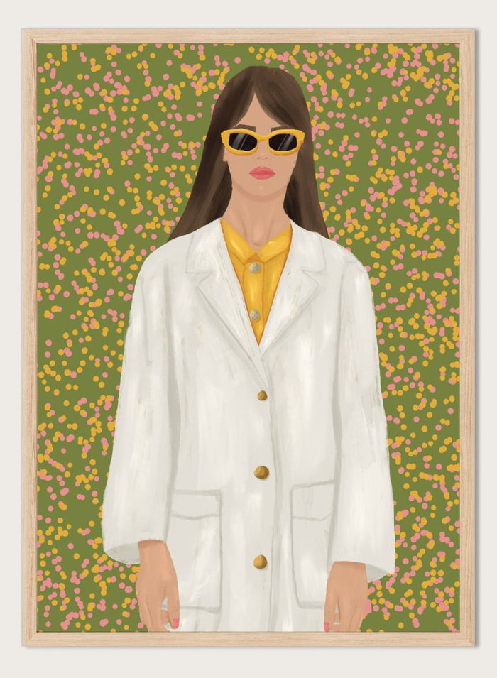 A stylized portrait of a woman wearing a white coat over a yellow top and yellow sunglasses, set against a green background filled with small pink and yellow dots. Chic Woman in Sunglasses by Lisa Solomoniuk premium framed fine art print featuring a woman in an oversized white coat and yellow sunglasses.