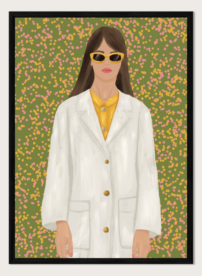 A stylized portrait of a woman wearing a white coat over a yellow top and yellow sunglasses, set against a green background filled with small pink and yellow dots. Chic Woman in Sunglasses by Lisa Solomoniuk premium framed fine art print featuring a woman in an oversized white coat and yellow sunglasses.