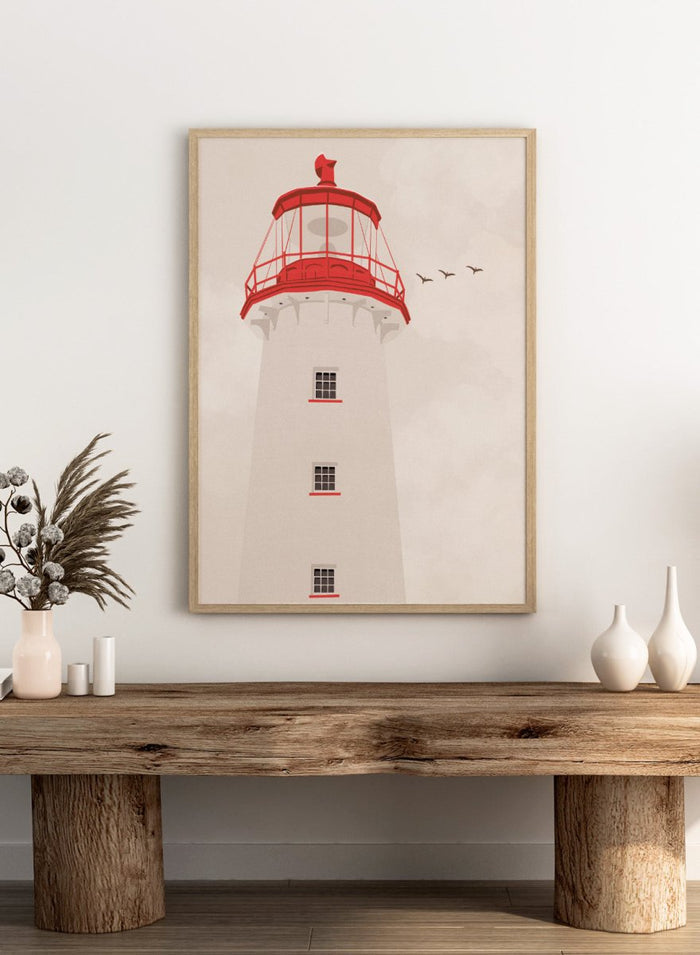 A stylized art print of a lighthouse with a white tower, a red lantern room, and a red lightning rod, set against a warm beige sky with three flying birds.  Coastal Red Lighthouse by Lisa Solomoniuk premium framed fine art print featuring a white lighthouse with bright red details beneath a pale coastal sky.