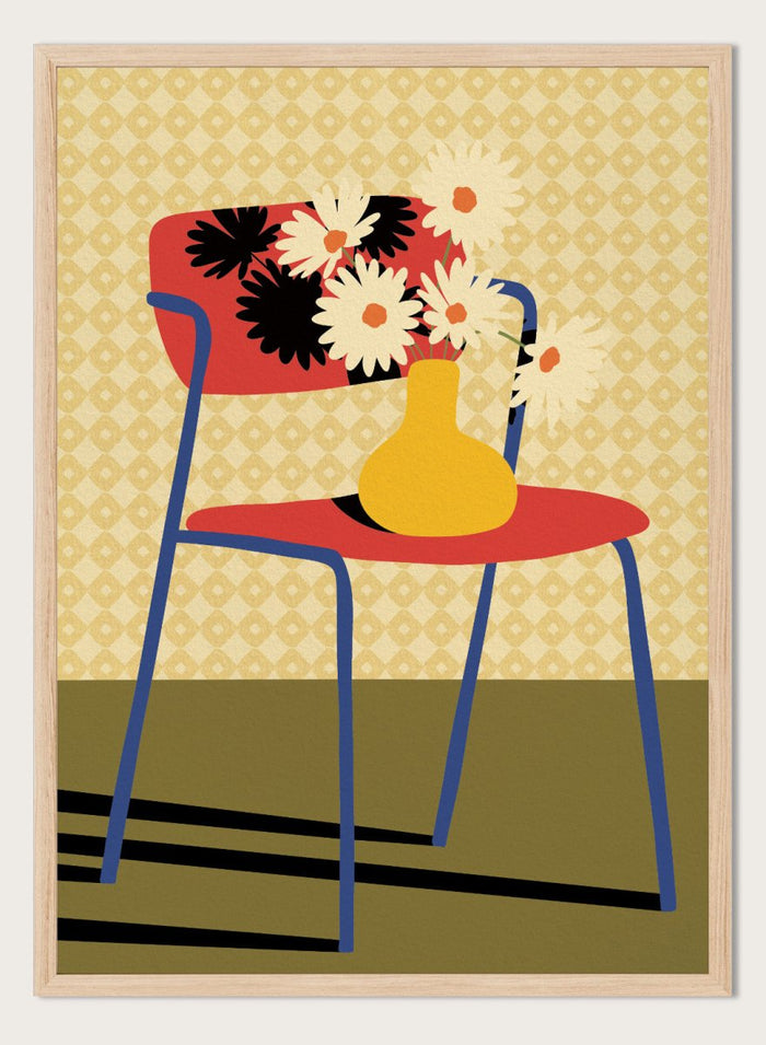 A stylized art print depicting a blue chair with a red seat and backrest, holding a yellow vase filled with white daisies, set against a patterned beige wallpaper and olive green floor. Colorful Chair Still Life by Lisa Solomoniuk premium framed fine art print featuring a red chair, yellow vase, white flowers, and bold graphic color.