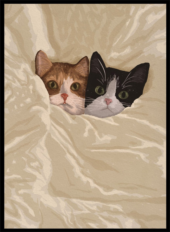 A stylized illustration of two cats peeking out from under a rumpled cream-colored blanket. The cat on the left is orange and white, and the cat on the right is black and white.  Cozy Cats Peeking Out by Lisa Solomoniuk premium framed fine art print featuring two cats tucked into soft cream bedding with wide-eyed expressions.