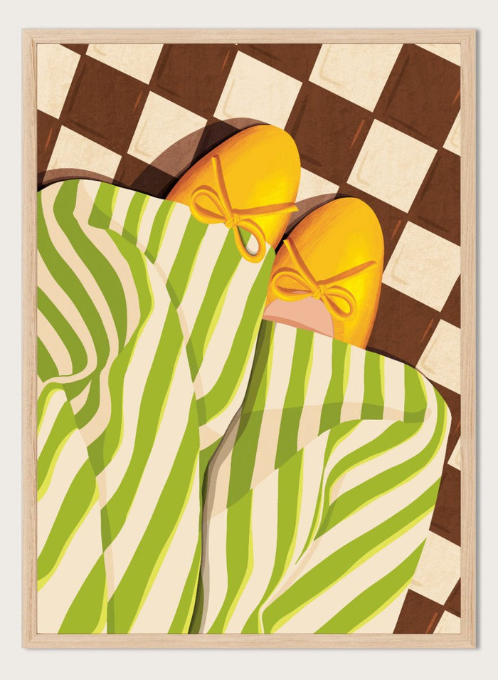 A stylized illustration of a person wearing green and white striped pajama pants and yellow slip-on shoes with bow details, lying on a brown and cream checkered floor. Cozy Striped Feet by Lisa Solomoniuk premium framed fine art print featuring yellow slippers, green striped trousers, and a bold checkered floor.