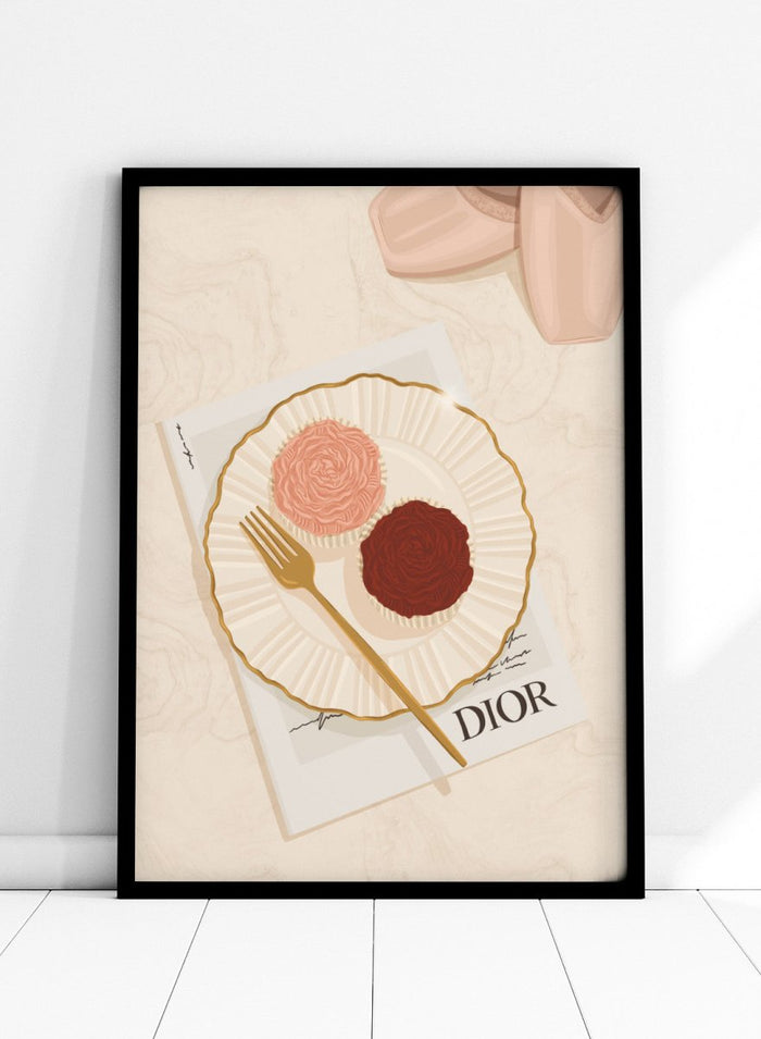 A stylized flat-lay illustration featuring a white plate with a gold rim holding two rose-shaped pastries, one light pink and one dark chocolate brown, with a gold fork on top. Elegant Cupcakes Ballet Shoes by Lisa Solomoniuk premium framed fine art print featuring pink ballet shoes, frosted cupcakes, and gold details.