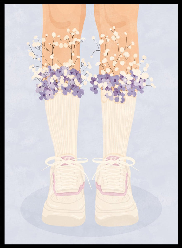 A stylized illustration of a person's legs wearing cream ribbed socks, white sneakers with pink trim, and bunches of small white and purple flowers at the top of the socks, set against a pale blue background. Floral Socks and Sneakers by Lisa Solomoniuk premium framed fine art print featuring cream sneakers with purple and white flowers.