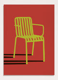 A minimalist graphic art print of a modern armchair, featuring a lime green chair silhouette on a solid red background with bold black shadows. Green Chair Shadow by Lisa Solomoniuk premium framed fine art print featuring a bright green chair and long black shadow against a deep red background.
