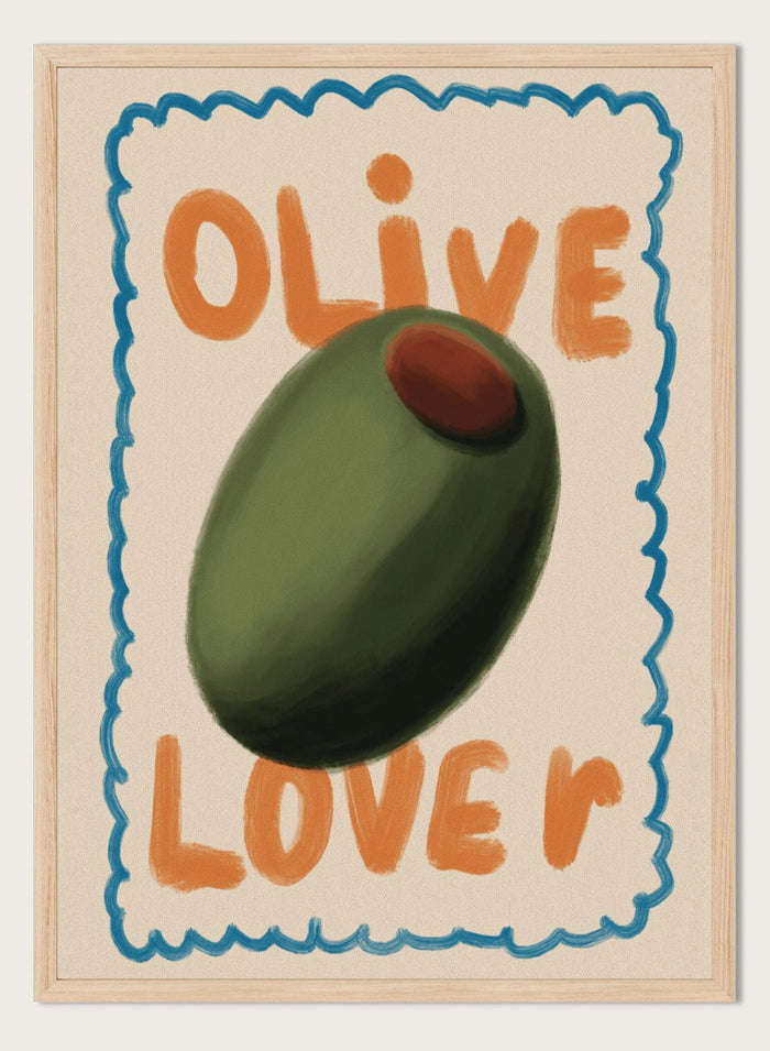An art print featuring a stylized illustration of an olive with the words 'OLIVE' at the top and 'LOVE' at the bottom, framed by a blue scalloped border on a cream background. Green Olive Lover by Lisa Solomoniuk premium framed fine art print featuring an oversized green olive, orange lettering, and a playful blue border.