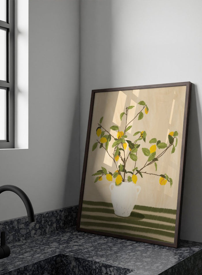 A framed still life artwork showing yellow lemons on leafy branches arranged in a white vase, set against a warm beige background with green horizontal stripes at the bottom. Lemon Tree Still Life by Lisa Solomoniuk premium framed fine art print featuring bright yellow lemons in a white vase on a striped green table.