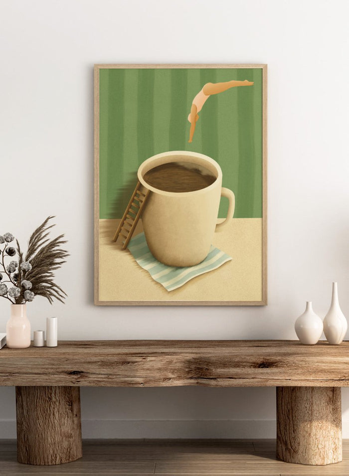 A whimsical illustrated scene showing a large beige mug filled with dark brown coffee on a striped napkin, with a small wooden ladder leaning against the mug and a diver mid-jump above the cup against a green striped background. Morning Coffee Dive by Lisa Solomoniuk premium framed fine art print featuring a tiny diver above an oversized coffee cup with a miniature ladder.