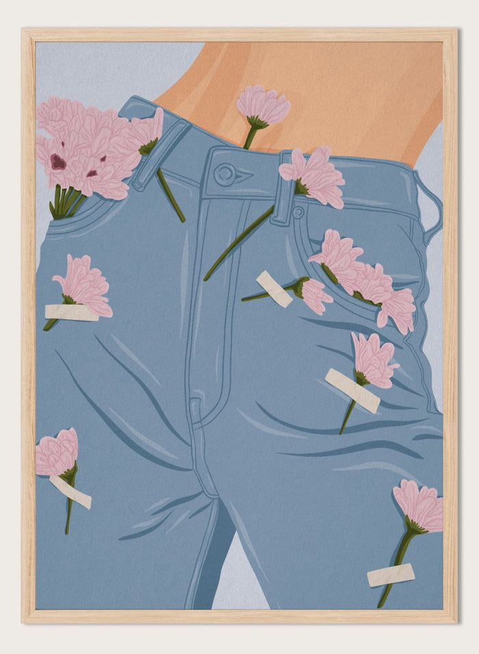 A stylized illustration of a person's lower torso wearing light blue jeans with several pink flowers pinned or attached to the fabric. The background is a pale blue-gray. Pink Flowers on Jeans by Lisa Solomoniuk fine art print featuring soft pink blooms tucked into light blue denim for a playful fashion-inspired look.