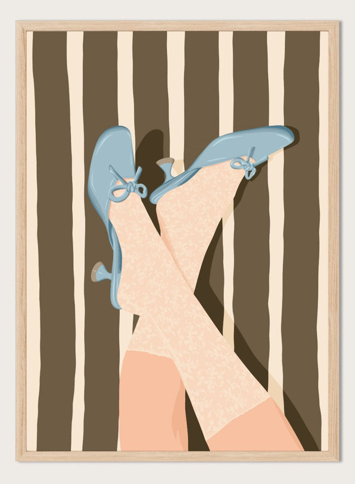 A stylized illustration of crossed legs wearing beige patterned socks and light blue kitten-heel flats with bow details, set against a brown and cream striped background. Whimsical Blue Heels by Lisa Solomoniuk premium framed fine art print featuring pale blue heels, patterned tights, and bold brown stripes.