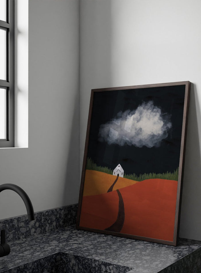 A stylized landscape artwork showing a white house on a hill, a dark winding path, orange and yellow fields, green grass, and a large white cloud against a very dark sky. Winding Path Church by Lisa Solomoniuk premium framed fine art print featuring a small white church beneath a dramatic cloud over red and ochre hills.