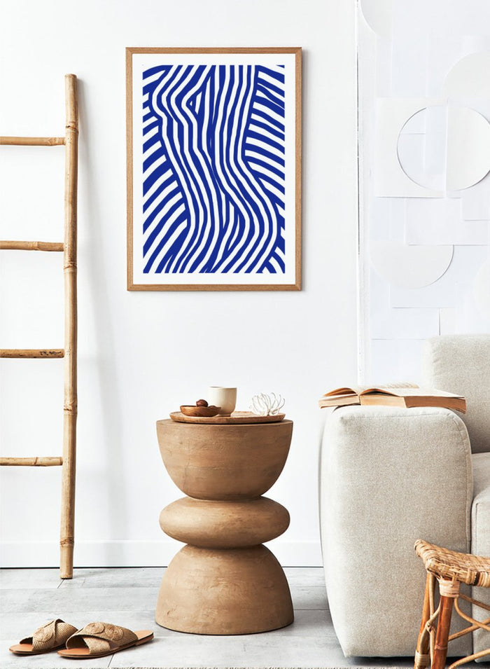 Blue and white wavy pattern on a white background. Blue and White Striped by Little Dean abstract optical illusion art print featuring striped silhouette, modern graphic pattern illustration wall art poster.