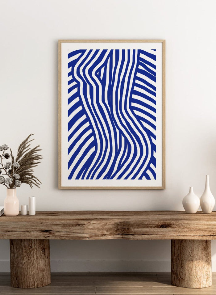 Blue and white wavy pattern on a white background. Blue and White Striped by Little Dean abstract optical illusion art print featuring striped silhouette, modern graphic pattern illustration wall art poster.