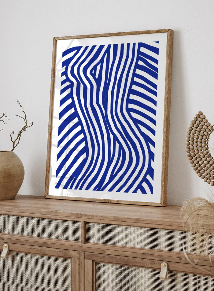 Blue and white wavy pattern on a white background. Blue and White Striped by Little Dean abstract optical illusion art print featuring striped silhouette, modern graphic pattern illustration wall art poster.