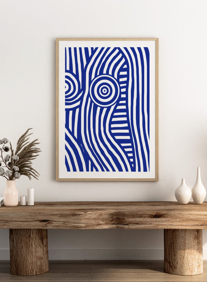 Abstract design with blue and white concentric circles on a white background. Blue and White Striped Figure by Little Dean abstract optical illusion art print featuring striped body form, modern graphic pattern illustration wall art poster.