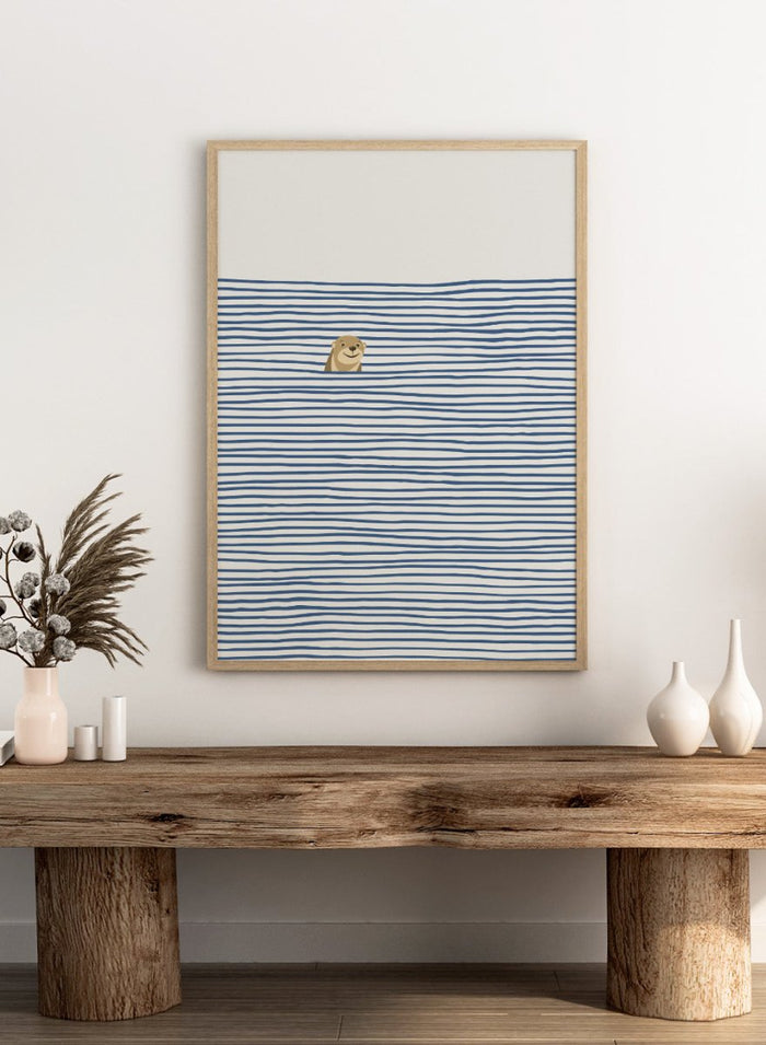 Otter in the Waves art print by Little Dean. Playful contemporary wall art featuring a smiling otter, blue wave pattern, minimalist illustration, and modern poster design.