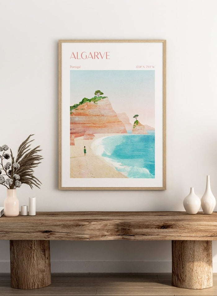 Illustration of a beach scene with cliffs and a person standing on the shore, labeled 'Algarve, Portugal'. Algarve Coastal Walk by Longwayhome is a minimalist coastal landscape art print featuring Portugal cliffs, turquoise ocean scenery, and modern travel inspired design.