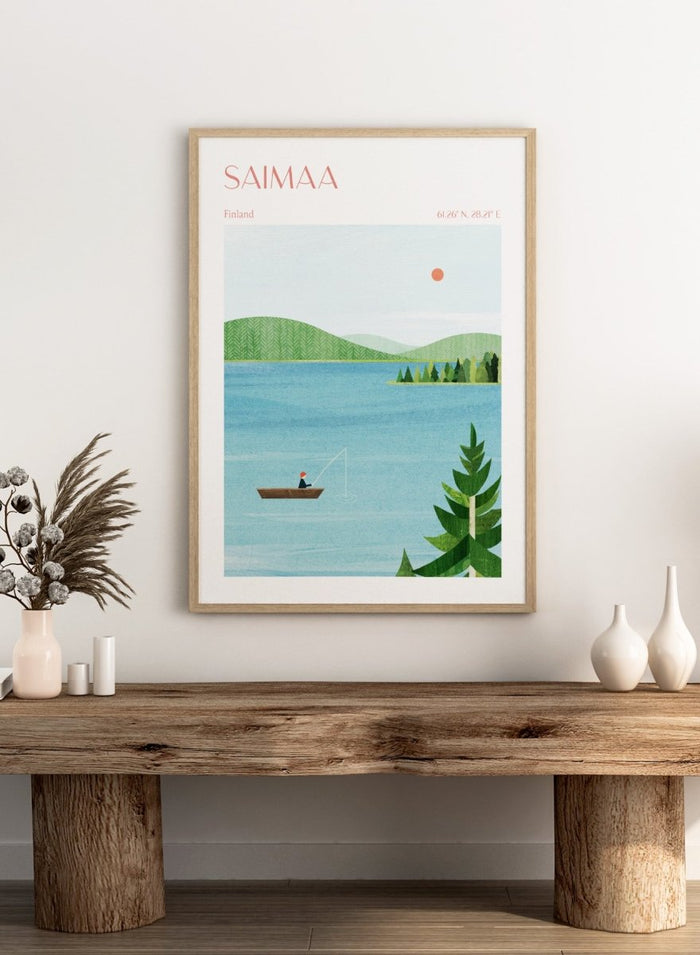 Illustration of a lake scene with a person fishing, surrounded by greenery and mountains, with 'Saimaa, Finland' text at the top. Calm Saimaa Lake Fishing by Longwayhome is a minimalist Scandinavian landscape art print featuring peaceful Finland lake scenery, forest views, and modern Nordic design.