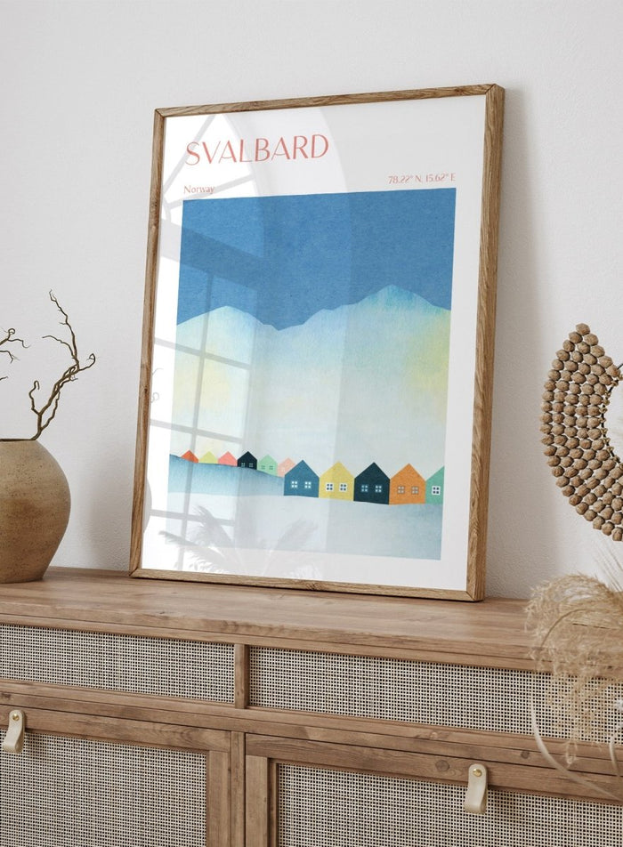 Poster of Svalbard with colorful houses and mountain landscape. Colorful Svalbard Winter Village by Longwayhome is a minimalist Scandinavian landscape art print featuring pastel houses, snowy mountains, and modern Nordic design.