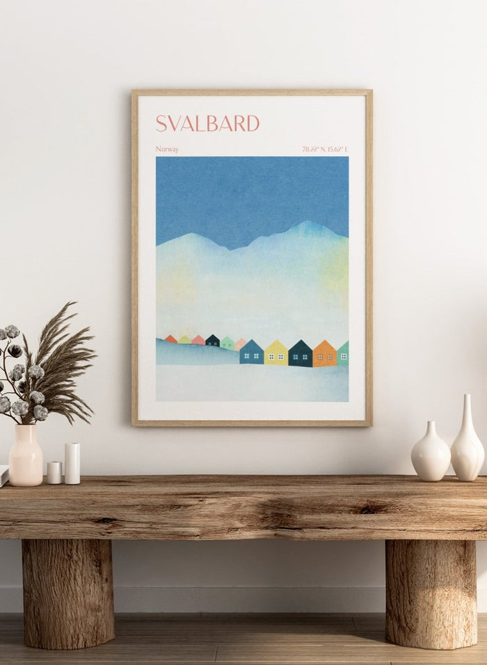 Poster of Svalbard with colorful houses and mountain landscape. Colorful Svalbard Winter Village by Longwayhome is a minimalist Scandinavian landscape art print featuring pastel houses, snowy mountains, and modern Nordic design.