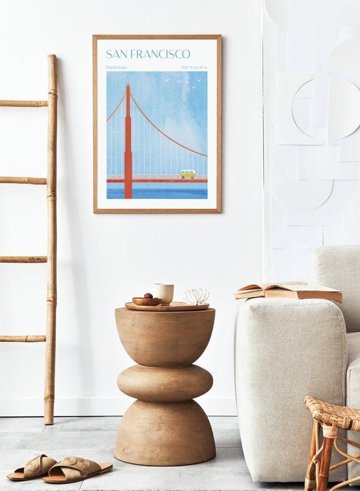 Illustration of the Golden Gate Bridge with a van and birds in San Francisco, United States. Golden Gate San Francisco by Longwayhome is a minimalist travel art print featuring the Golden Gate Bridge, coastal California scenery, and modern mid century inspired design.
