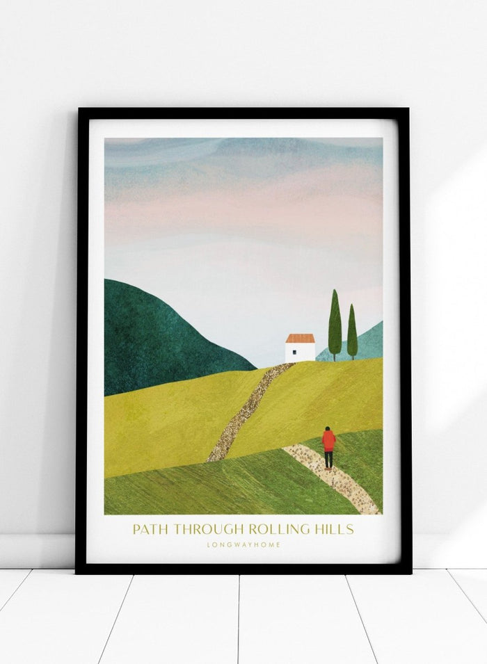 Illustration of a person walking along a path through rolling hills with a house and trees in the background. Path Through Rolling Hills by Longwayhome is a minimalist landscape art print featuring rolling green hills, countryside scenery, and modern travel inspired wall art.