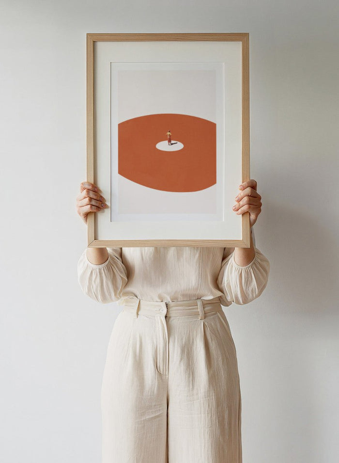 Confidence by Maarten Léon is a minimalist collage art print exploring self confidence through scale and space. Premium fine art print with real wood frame options.