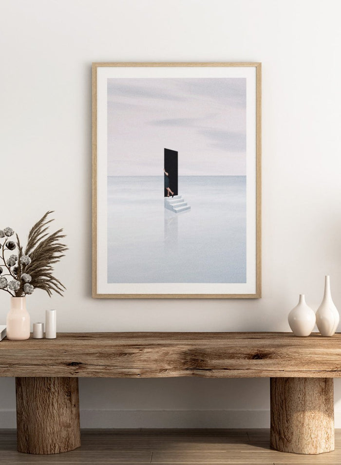 Curiosity by Maarten Léon is a minimalist collage art print showing a figure peering into a blue opening. Premium fine art print with real wood framing.