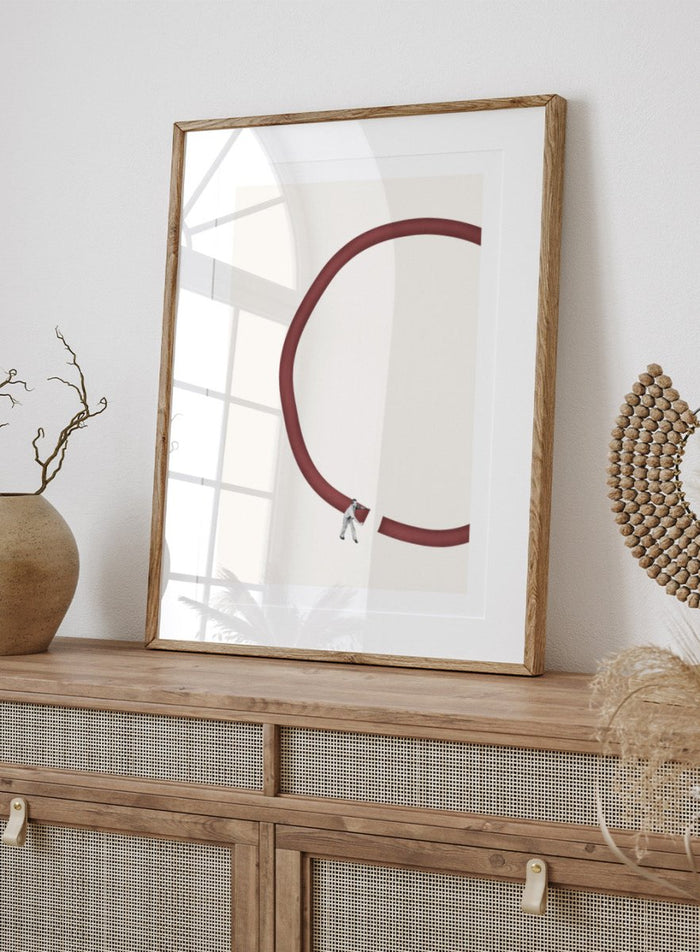 Let’s Reconnect by Maarten Léon is a minimalist collage art print showing a man repairing a broken graphic circle. Premium fine art print with real wood framing.