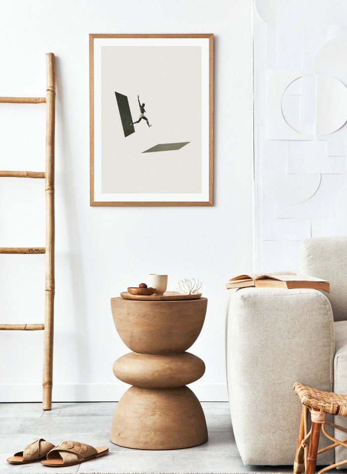 Not the One to Wait by Maarten Léon collage art print showing a figure jumping between platforms. Premium fine art print with real wood framing.
