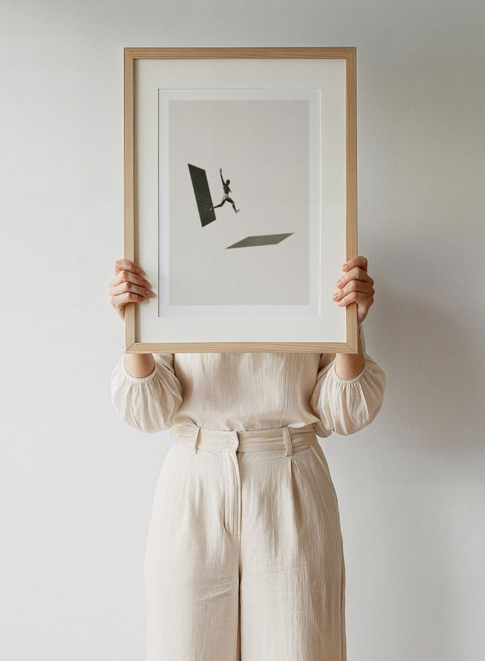 Not the One to Wait by Maarten Léon collage art print showing a figure jumping between platforms. Premium fine art print with real wood framing.