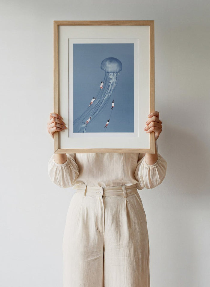 We Came Home Smiling by Maarten Léon is a minimalist collage art print exploring connection, memory, and shared moments. Premium fine art print with real wood framing.