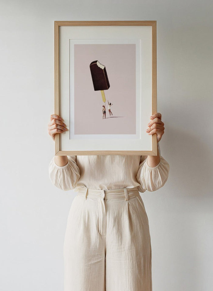 You Treat Me Well by Maarten Léon collage art print featuring two figures holding a melting ice cream. Premium fine art print with real wood framing.